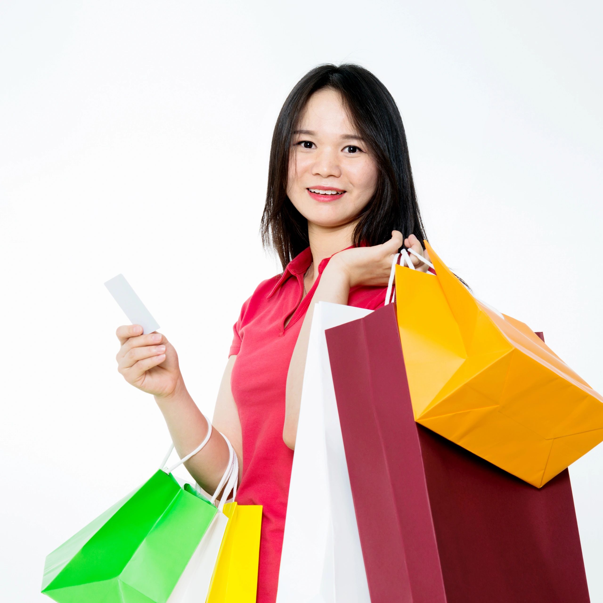 Happy customer holding shopping bags